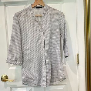 White button down shirt with tiny black polka dots